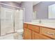 Bathroom features shower with sliding glass doors, vanity with sink and a comfort height toilet at 9682 Angelica Dr, Noblesville, IN 46060