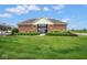 Community clubhouse featuring well-manicured lawn and landscaped entrance at 9682 Angelica Dr, Noblesville, IN 46060