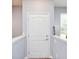Bright entryway featuring a classic white door, neutral walls, and natural light at 9682 Angelica Dr, Noblesville, IN 46060