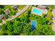Overhead shot of the community pool, tennis courts, and residential area at 9833 Parkshore Dr, Fishers, IN 46038