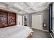 Bedroom features tray ceiling and en-suite bathroom at 9833 Parkshore Dr, Fishers, IN 46038