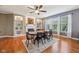 Dining area includes an inviting fireplace and built-in shelving for a warm gathering place at 9833 Parkshore Dr, Fishers, IN 46038
