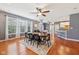 The spacious dining room features hard wood floors and an open connection to the living spaces at 9833 Parkshore Dr, Fishers, IN 46038