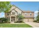Traditional brick home boasting attached three car garage and professionally landscaped yard at 9833 Parkshore Dr, Fishers, IN 46038