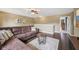 Open living room with a comfortable sectional sofa, stylish rug, and neutral wall colors at 9833 Parkshore Dr, Fishers, IN 46038