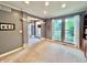 Comfortable living room with great natural light and carpet flooring at 9833 Parkshore Dr, Fishers, IN 46038