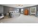Spacious main bedroom with gray walls, light carpet, large windows, and ample natural light at 9833 Parkshore Dr, Fishers, IN 46038