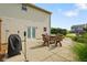 Spacious backyard patio with a table and chairs, perfect for outdoor entertaining and relaxation at 101 Meadowview Dr, Mooresville, IN 46158