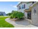 Two-story home with brick accents, a well-manicured lawn, and beautiful landscaping at 101 Meadowview Dr, Mooresville, IN 46158