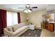 Comfortable living room with cozy sectional and patterned area rug at 101 Meadowview Dr, Mooresville, IN 46158