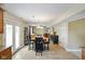 Open concept living room with tile floors and plenty of natural light at 101 Meadowview Dr, Mooresville, IN 46158