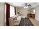Comfortable living room with cozy sectional and patterned area rug at 101 Meadowview Dr, Mooresville, IN 46158