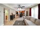 Cozy living room with comfortable seating and a ceiling fan at 101 Meadowview Dr, Mooresville, IN 46158