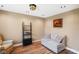 Cozy living room features a neutral color scheme, wood floors, and comfortable seating at 101 Meadowview Dr, Mooresville, IN 46158