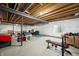 Spacious unfinished basement area with visible beams and infrastructure offering potential for customization at 1026 Woodglen Dr, Westfield, IN 46074