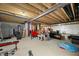 Unfinished basement with wooden rafters and exposed duct work at 1026 Woodglen Dr, Westfield, IN 46074