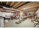 Spacious unfinished basement with high ceilings, exposed duct work, concrete floor, and overhead lighting at 1026 Woodglen Dr, Westfield, IN 46074