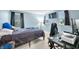 Bright bedroom featuring two large windows, neutral walls, and comfortable furnishings at 1026 Woodglen Dr, Westfield, IN 46074