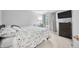 Comfortable bedroom with large windows, neutral walls, and a decorative lamp at 1026 Woodglen Dr, Westfield, IN 46074