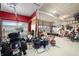 Neat garage with motorcycle, shelving, tools, and equipment providing functional space for storage and projects at 1026 Woodglen Dr, Westfield, IN 46074