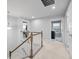 Spacious hallway featuring carpet flooring and decorative lighting at 1026 Woodglen Dr, Westfield, IN 46074