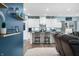 Stylish kitchen featuring granite counters, stainless appliances, and a cozy breakfast bar at 1026 Woodglen Dr, Westfield, IN 46074