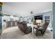 Open-concept living room flows into the kitchen, creating a comfortable and modern living space at 1026 Woodglen Dr, Westfield, IN 46074