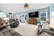 Spacious living room featuring comfortable seating, contemporary lighting, and a serene atmosphere at 1026 Woodglen Dr, Westfield, IN 46074