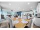 Open-concept living room boasts a spacious layout and modern eat-in kitchen with stainless steel appliances at 1026 Woodglen Dr, Westfield, IN 46074
