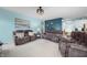Inviting living room with plush seating, soft lighting, and a layout perfect for entertaining or relaxing at 1026 Woodglen Dr, Westfield, IN 46074