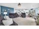Open-concept living area showcasing modern decor and seamless transitions to the kitchen and dining spaces at 1026 Woodglen Dr, Westfield, IN 46074