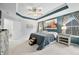 Main bedroom featuring a trey ceiling, great lighting, and ample storage at 1026 Woodglen Dr, Westfield, IN 46074