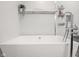 Detail shot of the white soaker tub in the primary bathroom at 10443 Ringtail Pl, Fishers, IN 46038