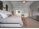 Spacious bedroom with light gray walls, ceiling fan, and decor at 10443 Ringtail Pl, Fishers, IN 46038