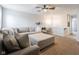 Comfortable living area with a large sectional sofa and inviting atmosphere at 10443 Ringtail Pl, Fishers, IN 46038