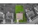 Aerial view of a home with expansive green lawn in a well-maintained neighborhood at 10515 Sugar Ridge Way, Indianapolis, IN 46239