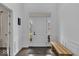 Bright entryway featuring a white door, detailed trim and wood flooring at 10515 Sugar Ridge Way, Indianapolis, IN 46239