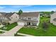 Beautiful two-story house featuring manicured lawn and lovely landscaping at 10515 Sugar Ridge Way, Indianapolis, IN 46239