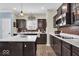 Modern kitchen with island, stainless steel appliances, and ample counter space at 10515 Sugar Ridge Way, Indianapolis, IN 46239
