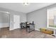 A bright office with modern decor, wood flooring, and a neutral color palette at 10515 Sugar Ridge Way, Indianapolis, IN 46239