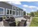 Spacious back patio with outdoor seating, a grill, and a tranquil view at 10655 E 200 S, Zionsville, IN 46077