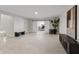 Finished basement with tiled floors, a sliding barn door, and potential for multiple uses at 10655 E 200 S, Zionsville, IN 46077