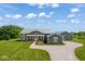Beautiful exterior with a metal roof, wraparound porch, meticulous landscaping and a circular drive on a large lot at 10655 E 200 S, Zionsville, IN 46077