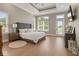 Spacious bedroom with abundant natural light and tray ceiling at 10655 E 200 S, Zionsville, IN 46077
