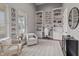 Bright and airy office with built-in bookcases, a stylish desk and large window at 10655 E 200 S, Zionsville, IN 46077