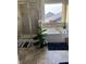 Bathroom features a bathtub, shower, stylish tile, and modern fixtures, complemented by soothing decor at 10835 Spirit Dr, Ingalls, IN 46048