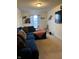 Spacious living room with comfortable seating, and a TV, great for relaxing and entertainment at 10835 Spirit Dr, Ingalls, IN 46048