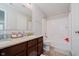 Bathroom featuring double sinks, granite counters, and a shower-tub combination at 10962 Stoneleigh Dr, Noblesville, IN 46060