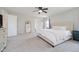 Spacious bedroom with a king bed, carpet, neutral walls, natural light, and decor to enhance comfort at 10962 Stoneleigh Dr, Noblesville, IN 46060