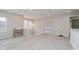 Bright, carpeted loft area with ample space, great lighting, and versatile design potential for various activities at 10962 Stoneleigh Dr, Noblesville, IN 46060